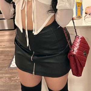 Leather mini black skirt